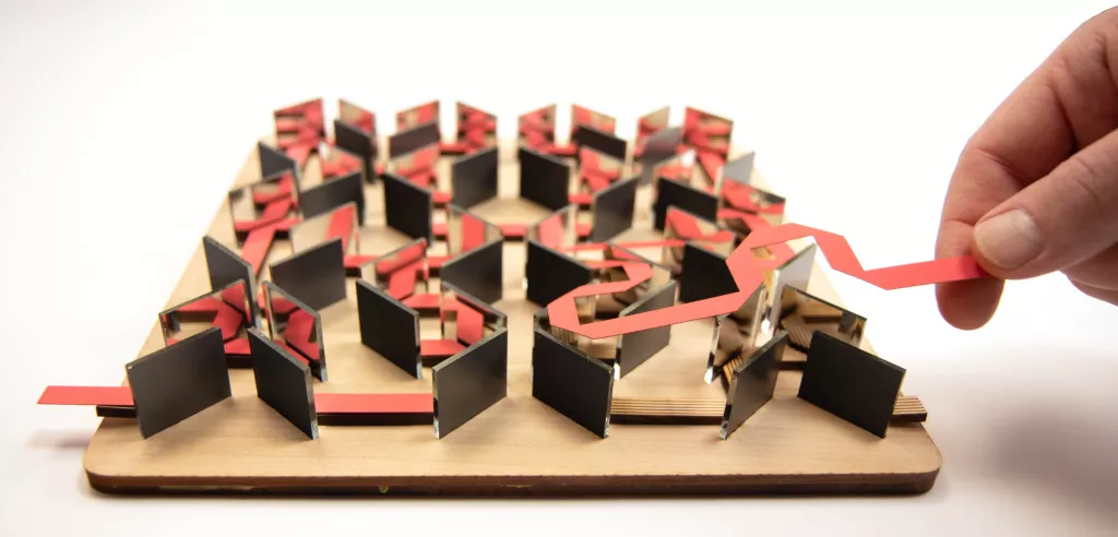 This is a mirror labyrinth, made with 52 small mirrors, with a symbolic “laser beam” that traces out the Hilbert curve. (Photo: Edmund Harriss)